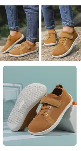 Close-up of mustard yellow breathable mesh barefoot shoes with durable white flat soles