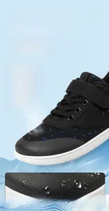 Detail of breathable knit upper and TPU waterproof toe cap on kids barefoot sneakers