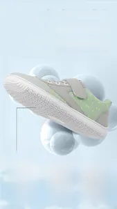 Detail of kids barefoot shoes showing non-slip rubber outsole and velcro strap design