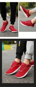 Close-up of red breathable mesh barefoot shoes with anti-slip white rubber soles for hiking