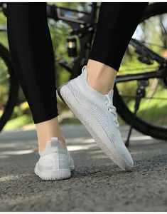Close-up of lightweight breathable mesh sneakers with hexagonal anti-slip rubber outsoles