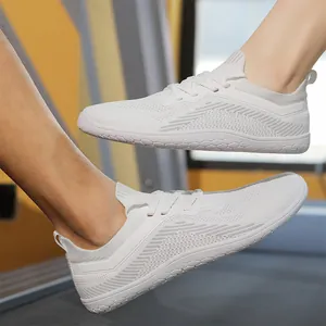 White minimalist wide toe box knit sneakers for gym fitness and athletic activities