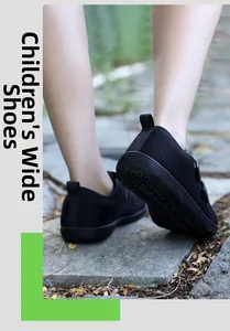 Macro view of children's wide toe box barefoot shoes with non-slip sole for outdoor hiking
