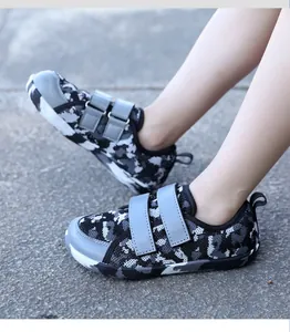 Detailed side view of camouflage kids barefoot shoes with adjustable velcro straps
