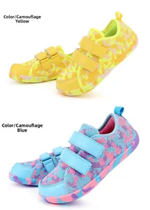 Close-up of kids wide toe shoes with dual velcro straps in Camo Yellow and Camo Moon