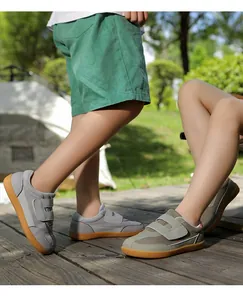 Close-up of kids breathable mesh barefoot shoes with adjustable velcro and rubber soles