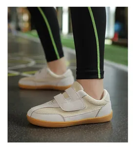 Close-up of kids barefoot sneakers with breathable mesh and anti-slip rubber soles
