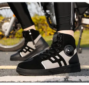Close-up of waterproof motorcycle boots with ankle protection and gear shift pad details