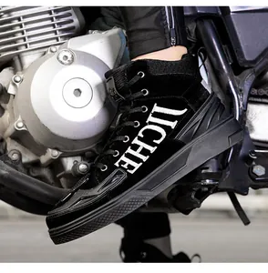 Close-up of black high-top motorcycle boots with durable suede texture and LICHE branding