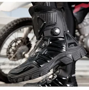 Close-up of waterproof motorcycle boot with rotary dial lacing and protective mesh texture