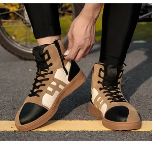 Detail of motorcycle boots featuring side zipper closure and reinforced toe protection