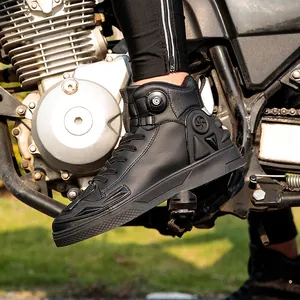 Waterproof high-top motorcycle boots with rotary buckle system on a bike pedal