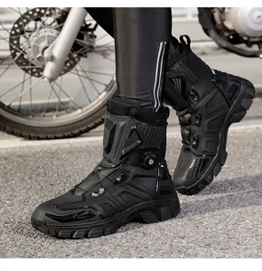 Detail of professional black motorcycle boots with protective armor and rotary buckle