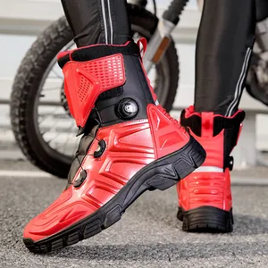 Waterproof motorcycle riding boots in red and black with rotary lace adjustment