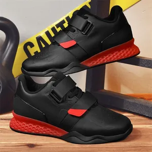 Professional weightlifting shoes with dual straps and honeycomb sole for squatting