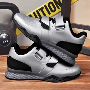 Professional silver and black weightlifting shoes with double straps for powerlifting