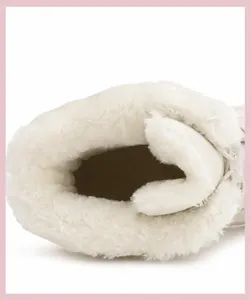 Close-up of thick white warm plush lining inside waterproof winter boots for cold protection