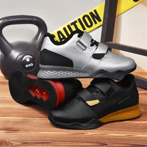 Professional weightlifting shoes with dual straps and honeycomb grip sole for squat training