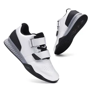 Professional white weightlifting shoes with dual straps and shock-absorbing heel