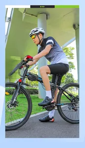 Outdoor cyclist wearing professional black cycling shoes and aluminum road bike gear