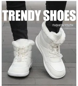 Close-up of cream winter snow boots with thick faux fur lining and drawstring laces