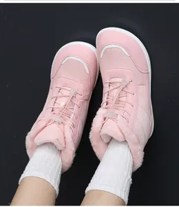 Top view of pink waterproof winter boots with thick plush lining and drawstring closure
