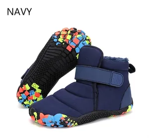 Navy blue kids winter boots with warm lining and colorful non-slip camouflage rubber sole