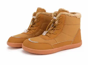 Detail of brown waterproof snow boots with thick plush lining and elastic drawstring
