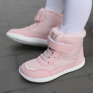 Pink winter snow boots for kids featuring warm plush lining and anti-slip rubber soles