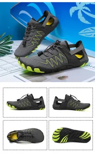 Detail der grauen Wasserschuhe mit neongrüner Gummisohle und Schnellverschlusssystem
