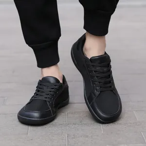 All-black barefoot wide-toe training shoes with breathable mesh and rubber sole for outdoor