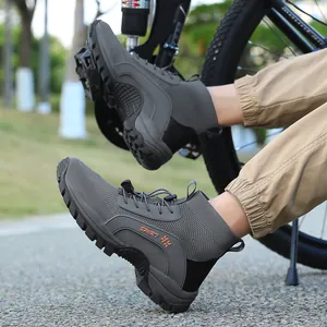 Zapatos de senderismo gris oscuro con malla transpirable y suelas de goma antideslizantes