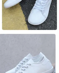 Details weißer Barfuß-Wanderschuhe mit Fokus auf Nähte am Kunstleder und die weiße Schnürung