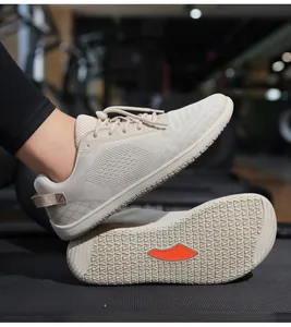 Close-up of lightweight breathable mesh barefoot shoes with anti-slip rubber soles