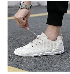 Close-up of adjustable elastic laces on minimalist barefoot shoes for outdoor walking