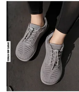 Close-up of kids wide toe barefoot running shoes on treadmill for fitness and sports