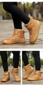 Detail of kids winter boots showing plush lining, durable texture, and velcro strap
