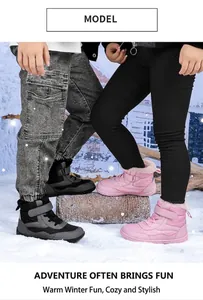 Kids winter boots with velcro closure and warm plush lining on snow background