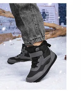 Detail of waterproof winter barefoot boots for kids featuring warm black plush lining
