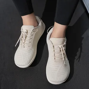 Kids barefoot running shoes in beige mesh with quick-lace system for outdoor hiking