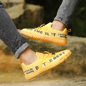 Bright yellow wide-toe hiking shoes with DO THE BEST print and durable rubber soles