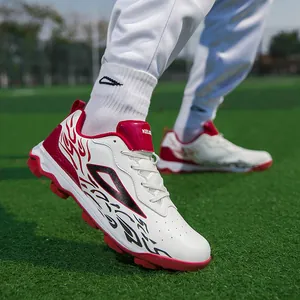 Men's low-top football shoes in white and red with flame patterns and rubber turf cleats