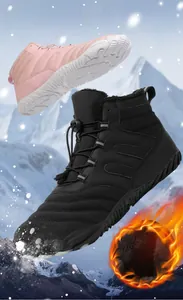 Detailed view of warm winter snow boots featuring thermal faux fur lining and anti-slip sole
