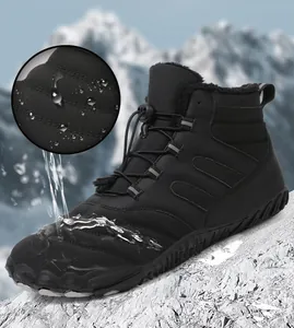 Waterproof detail of black winter snow boots with fleece lining and drawstring closure