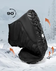 Flexible non-slip sole of waterproof winter snow boot showing 90-degree bend durability
