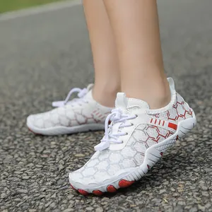 Chaussures aquatiques enfant blanches et oranges avec laçage rapide pour la plage