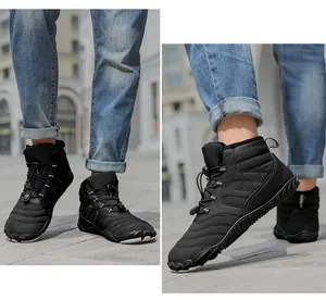 Close-up of men's waterproof snow boots with thick thermal fleece lining and rubber sole