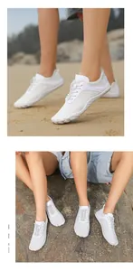Detailed view of white breathable mesh upper and elastic drawstring on wading shoes