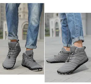 Detail view of winter boots showing thick faux fur lining and non-slip rubber soles