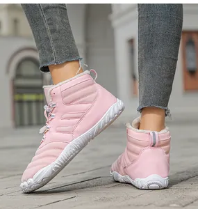 Pink waterproof winter snow boots with warm faux fleece lining and durable rubber sole
